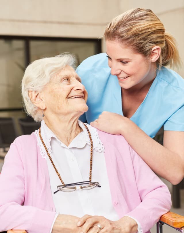 home care - nurse and old woman